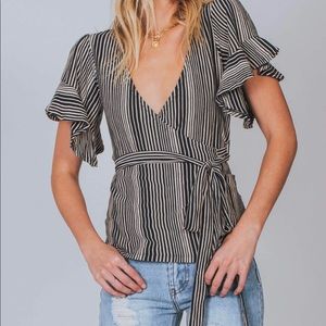 Free People “wrapped around my finger” top  sz L